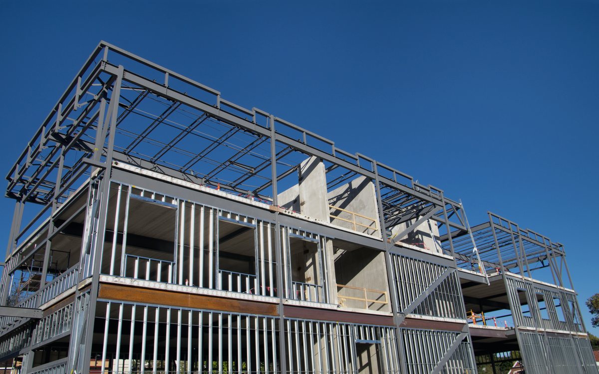 Steel and light gauge framing going up on a multi level commercial structure